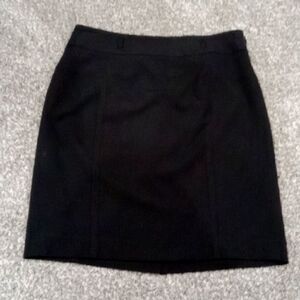 Kenneth Cole NY Black Mini skirt fully lined with side zip and back slit size 4